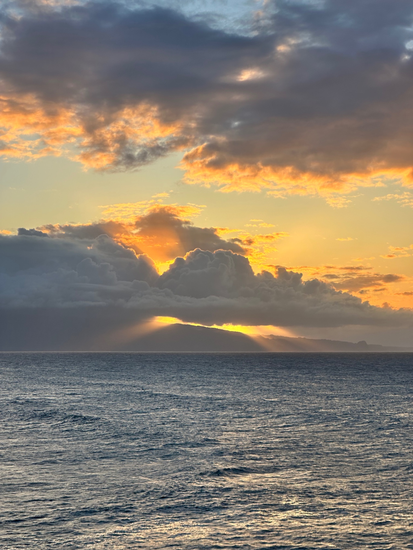 Golden light through clouds over the Pacific